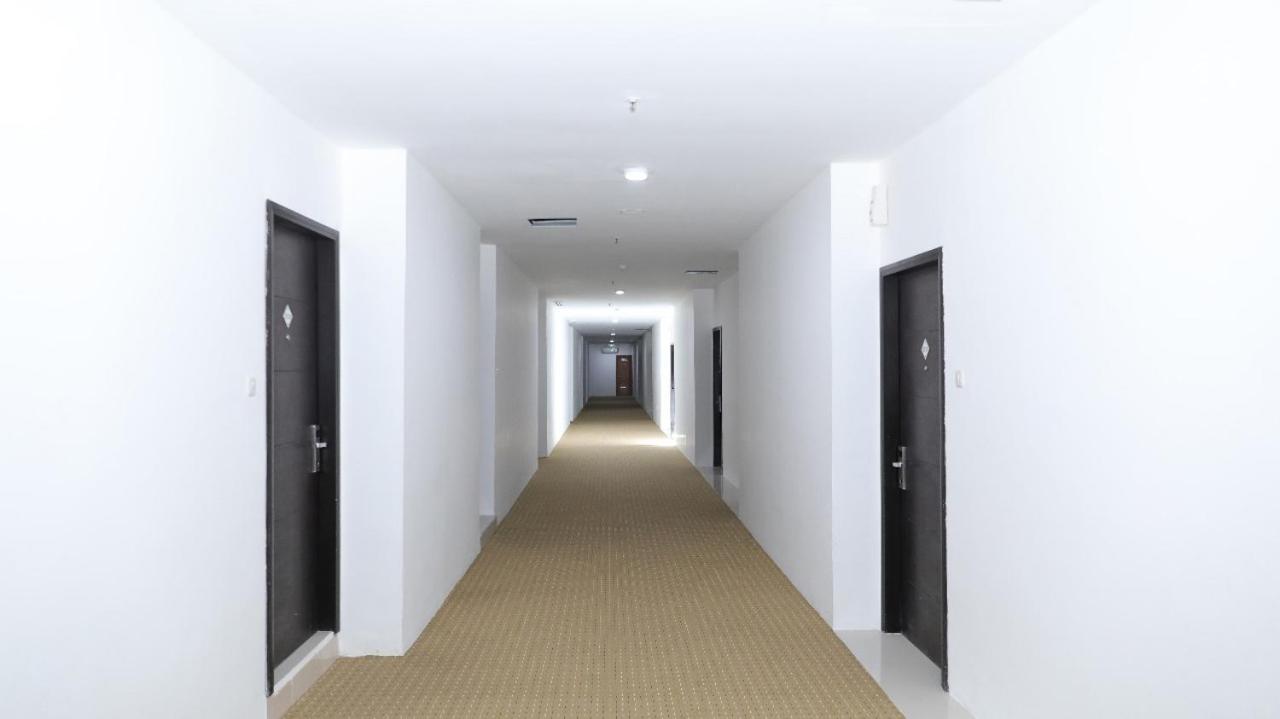 Heavenly Land Family Hotel Palembang Buitenkant foto
