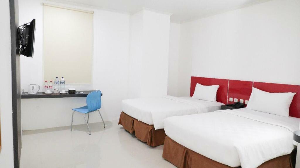 Heavenly Land Family Hotel Palembang Buitenkant foto