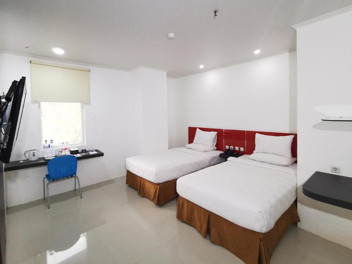 Heavenly Land Family Hotel Palembang Buitenkant foto